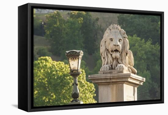 Hungary, Budapest. Lion sculpture on the Szechenyi Chain Bridge.-Tom Haseltine-Framed Premier Image Canvas