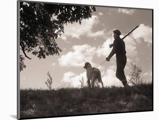 Hunter Walking with Bird Dog-Philip Gendreau-Mounted Photographic Print