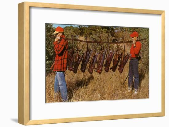 Hunters Carrying Giant Grasshoppers-null-Framed Art Print