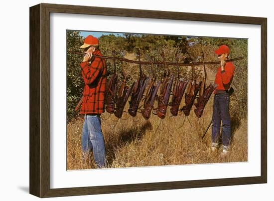 Hunters Carrying Giant Grasshoppers-null-Framed Art Print