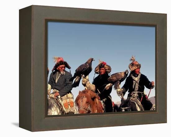 Hunters from Sagsai Sum, Bechik, Tek and Khalbek, Golden Eagle Festival, Mongolia-Amos Nachoum-Framed Premier Image Canvas