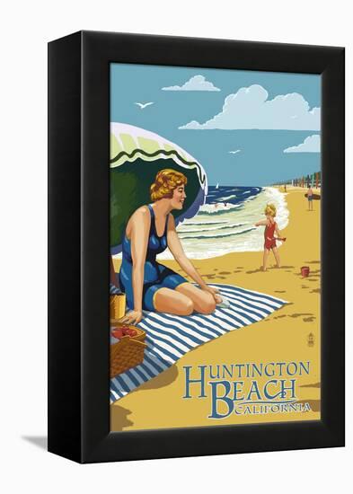 Huntington Beach, California - Woman on Beach-Lantern Press-Framed Stretched Canvas