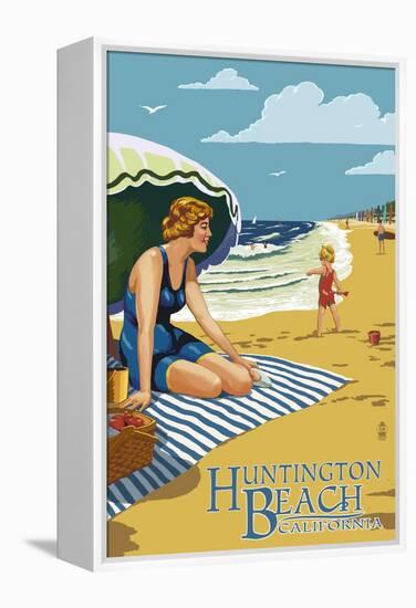 Huntington Beach, California - Woman on Beach-Lantern Press-Framed Stretched Canvas