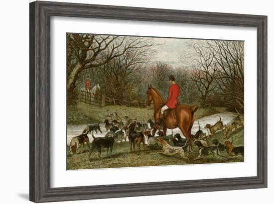 Huntsman with Foxhounds Tracking a Scent Across a Brook, England, 1800s-null-Framed Giclee Print