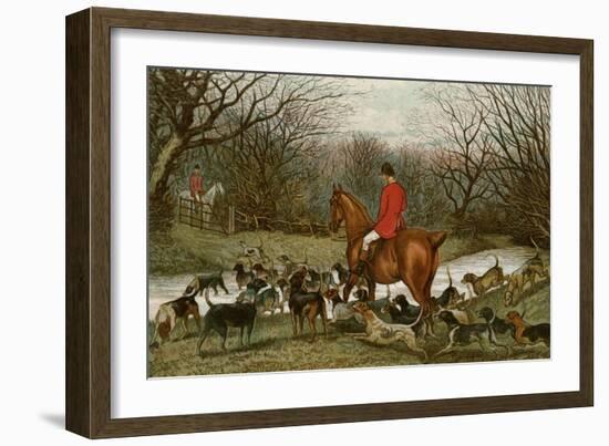 Huntsman with Foxhounds Tracking a Scent Across a Brook, England, 1800s-null-Framed Giclee Print