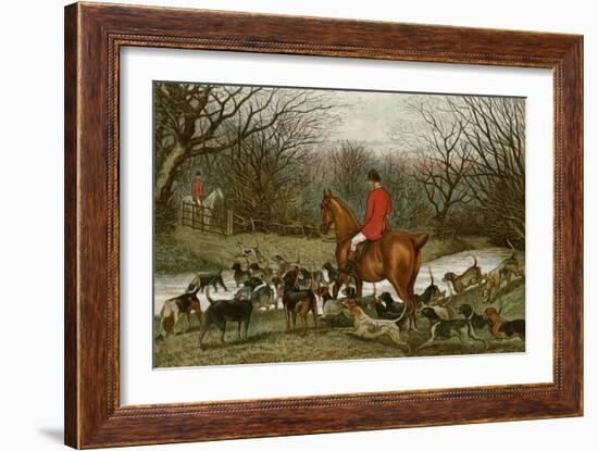 Huntsman with Foxhounds Tracking a Scent Across a Brook, England, 1800s-null-Framed Giclee Print