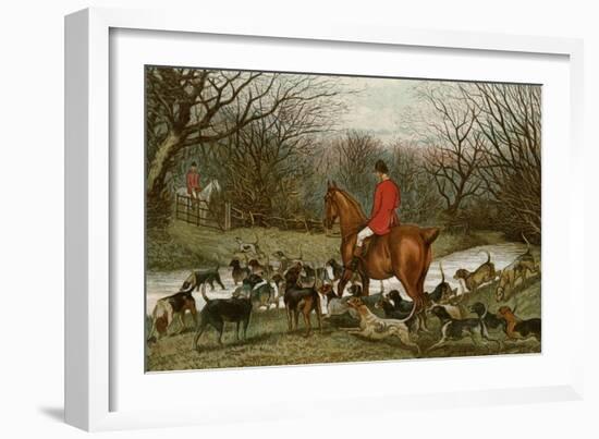 Huntsman with Foxhounds Tracking a Scent Across a Brook, England, 1800s-null-Framed Giclee Print