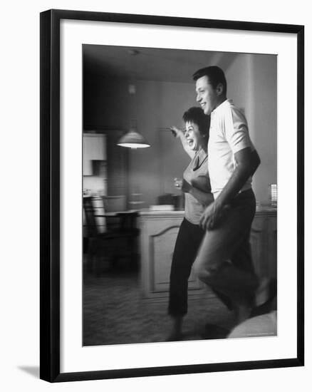Husband and Wife Singers Steve Lawrence and Eydie Gorme Clowning in Their Apartment-Alfred Eisenstaedt-Framed Premium Photographic Print