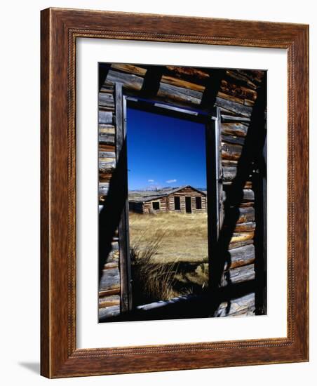 Hut Framed by Window of Burnt Log Cabin, Wind River Country, Lander, USA-Brent Winebrenner-Framed Photographic Print