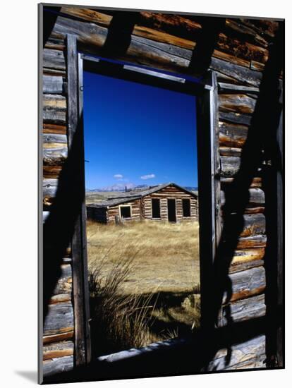 Hut Framed by Window of Burnt Log Cabin, Wind River Country, Lander, USA-Brent Winebrenner-Mounted Photographic Print