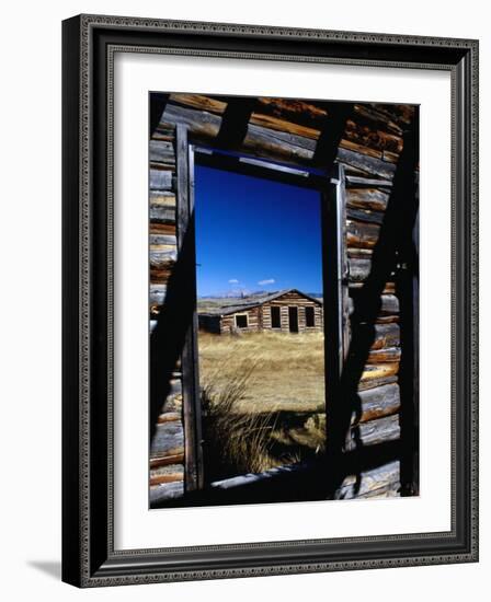 Hut Framed by Window of Burnt Log Cabin, Wind River Country, Lander, USA-Brent Winebrenner-Framed Photographic Print