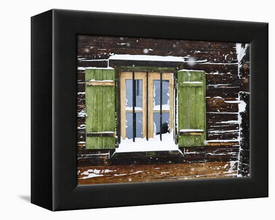 hut window with shutters, snowdrift, detail-Martin Ley-Framed Premier Image Canvas