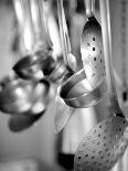 Ladles and Slotted Spoons Hanging up in a Kitchen-Huw Jones-Laminated Photographic Print