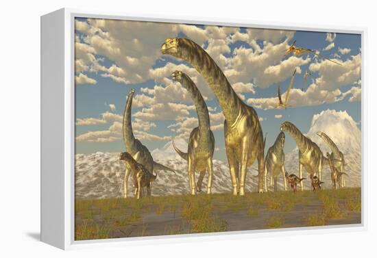 Hypsilophodon and Pteranodon Dinosaurs Accompany a Herd of Argentinosaurus-null-Framed Stretched Canvas