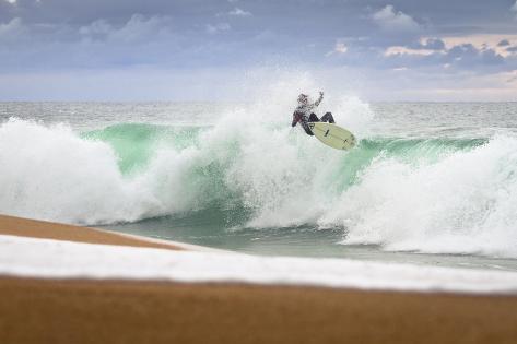 Photographic Print: A Local Surfing The Nice Waves At Plage Des Casernes At The French Atlantic Coast by Axel Brunst: 24x16in