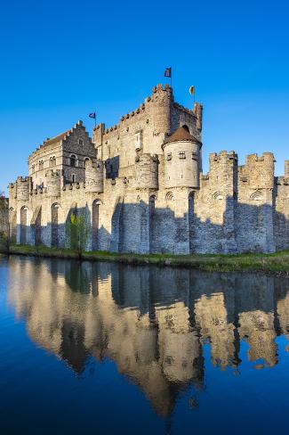 Photographic Print: Belgium, Flanders, Ghent (Gent). Gravensteen castle, 12th century medieval castle on the Leie River by Jason Langley: 36x24in