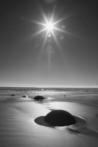 Premium Photographic Print: New Zealand, South Island. BW starburst over Moeraki Boulders Scenic Reserve. by Jaynes Gallery: 36x24in