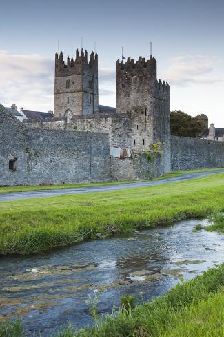 Premium Photographic Print: Ireland, County Tipperary, Fethard, town walls, dusk by Walter Bibikow: 36x24in