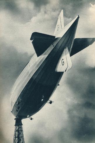 Photographic Print: British rigid airship R101 riding at her mooring mast at Cardington, Bedfordshire, c1929: 12x8in