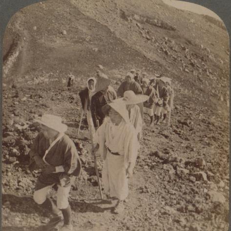 Photographic Print: 'Pilgrims, at end of weary ascent, in worship encircling crater of sacred Fujiyama, Japan', 1904: 16x16in