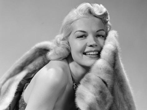 Photographic Print: 1950s GLAMOROUS WOMAN POSING WEARING STRAPLESS DRESS & FUR STOLE DRAPED OVER ONE SHOULDER AND HE. by Panoramic Images: 12x9in Photographic Print: 1950s GLAMOROUS WOMAN POSING WEARING STRAPLESS DRESS & FUR STOLE DRAPED OVER ONE SHOULDER AND HE. by Panoramic Images: 12x9in