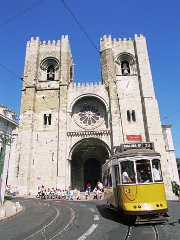 Photographic Print: Electrico (Electric Tram) in Front of the Se Cathedral, Lisbon, Portugal by Yadid Levy: 24x18in