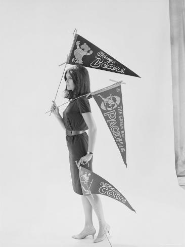 Premium Photographic Print: Writer Gloria Steinem Carrying Pennants for Professional Football Teams by Yale Joel: 24x18in