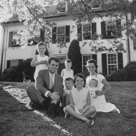 Photographic Print: Future Atty. Gen. Robert Kennedy Posing with Wife and Children in Front of Their Hickory Hill Home by Paul Schutzer: 16x16in