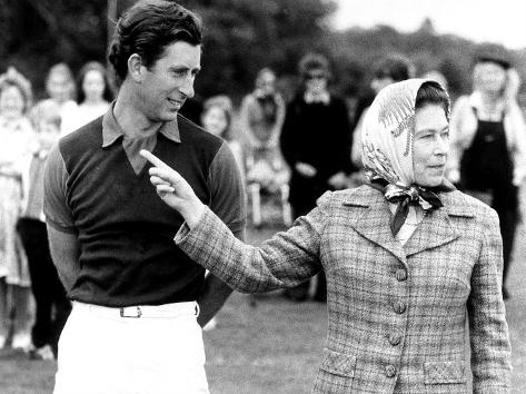 Photographic Print: Queen Elizabeth II Shows Prince Charles Sign at a Polo Match at Windsor Great Park Points Finger: 24x18in