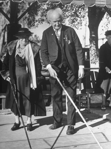 Premium Photographic Print: Elderly Couple Playing a Game of Shuffleboard on Outdoor Court at Hotel by Alfred Eisenstaedt: 24x18in