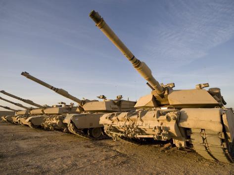 Photographic Print: Poster of M1 Abrams Tanks at Camp Warhorse by Stocktrek Images: 24x18in