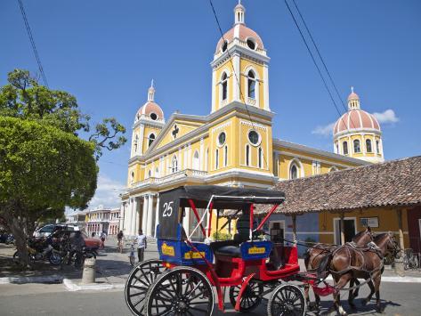 Photographic Print: Horse Cart Passing Cathedral De Granada, Park Colon (Park Central), Nicaragua, Central America by Jane Sweeney: 24x18in