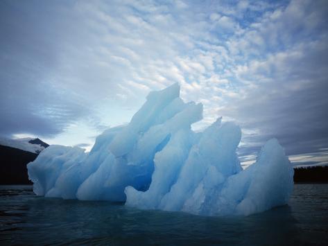 Photographic Print: Usa, Alaska, Iceberg Floating on the Water by Jeff Foott: 24x18in