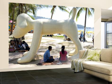 Wall Mural - Large: People Sitting under Dog Statue on Patong Beach by Austin Bush: 144x96in