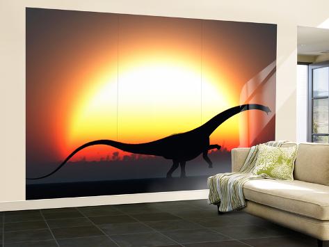 Wall Mural - Large: A Silhouetted Diplodocus Dinosaur Takes at the Start of a Prehistoric Day by Stocktrek Images: 144x96in