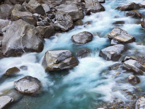 Photographic Print: Verzasca River rushing over boulders Poster by Frank Krahmer: 24x18in