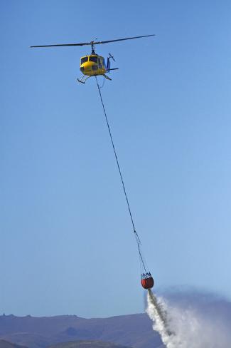 Photographic Print: Iroquois Helicopter, Monsoon Bucket Poster by David Wall: 24x16in
