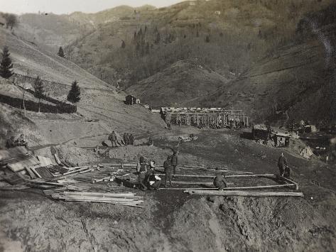 Photographic Print: Construction of Military Barracks in the Valley Doblar During the First World War by Luigi Verdi: 24x18in