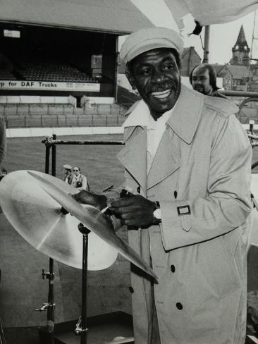 Photographic Print: Drummer Mickey Roker at the Newport Jazz Festival, Ayresome Park, Middlesbrough, 1978 by Denis Williams: 24x18in