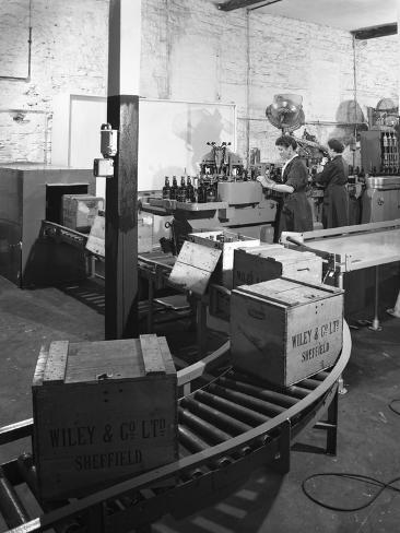 Photographic Print: The Final Stages of Bottling Whisky at Wiley and Co, Sheffield, South Yorkshire, 1960 by Michael Walters: 24x18in