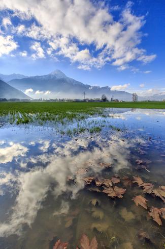 Photographic Print: The Natural Reserve of Pian Di Spagna Flooded with Mount Legnone Reflected in the Water, Italy by Roberto Moiola: 24x16in