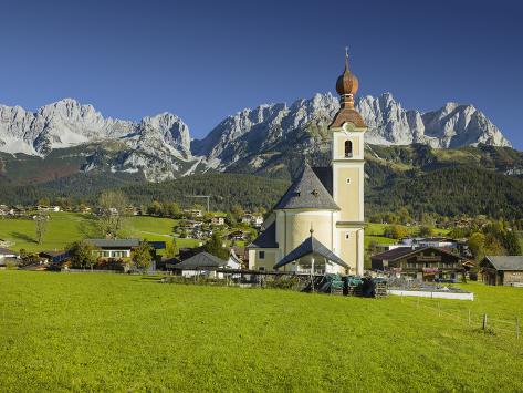 Art.com Photographic print: church in going, wilder kaiser (wild kaisr mountain), tyrol, austria by rainer mirau: 24x18in