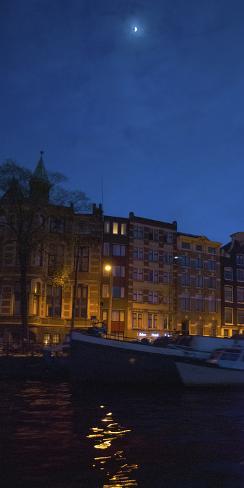 Photographic Print: View of Amsterdam Canal at Night by Anna Miller: 24x12in