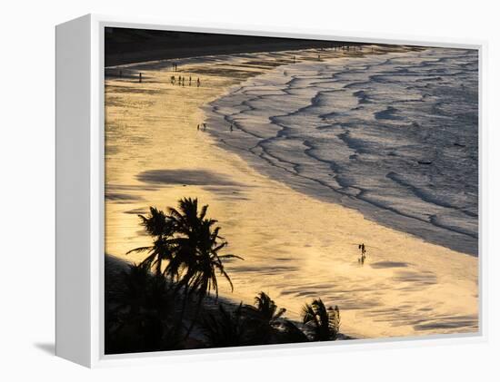 Icapui Beach, with People Fishing and Playing at Sunset-Alex Saberi-Framed Premier Image Canvas