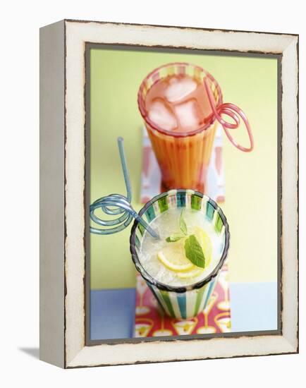 Ice-Cold Lemonade and Pink Grapefruit Juice in Glasses-null-Framed Premier Image Canvas