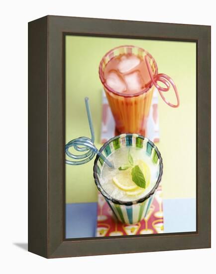 Ice-Cold Lemonade and Pink Grapefruit Juice in Glasses-null-Framed Premier Image Canvas