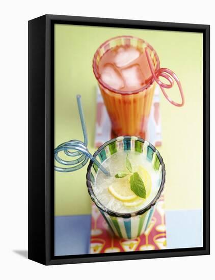 Ice-Cold Lemonade and Pink Grapefruit Juice in Glasses-null-Framed Premier Image Canvas