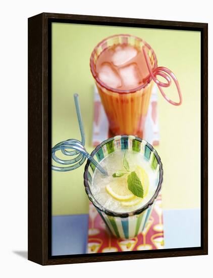 Ice-Cold Lemonade and Pink Grapefruit Juice in Glasses-null-Framed Premier Image Canvas