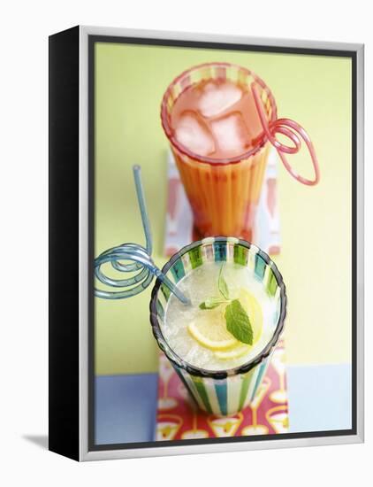 Ice-Cold Lemonade and Pink Grapefruit Juice in Glasses-null-Framed Premier Image Canvas
