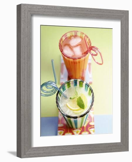 Ice-Cold Lemonade and Pink Grapefruit Juice in Glasses-null-Framed Photographic Print